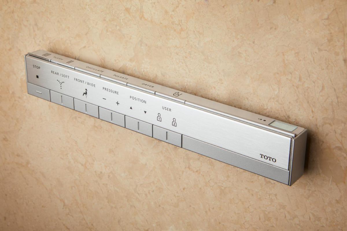 a metal object on a wall with a ruler at The Residency Towers in Chennai