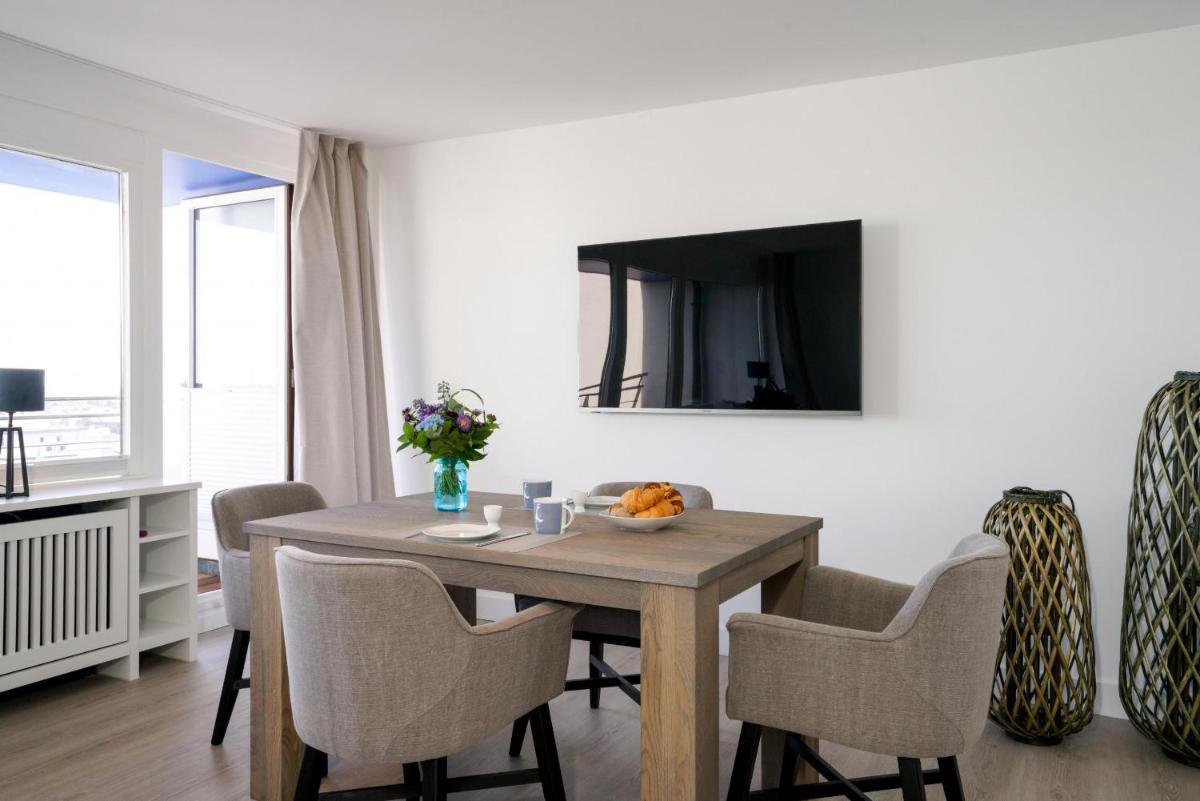 Ferienwohnung Sylter Welle mit kleinem Meerblick - Housity