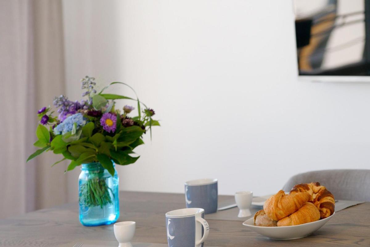 Ferienwohnung Sylter Welle mit kleinem Meerblick - Housity