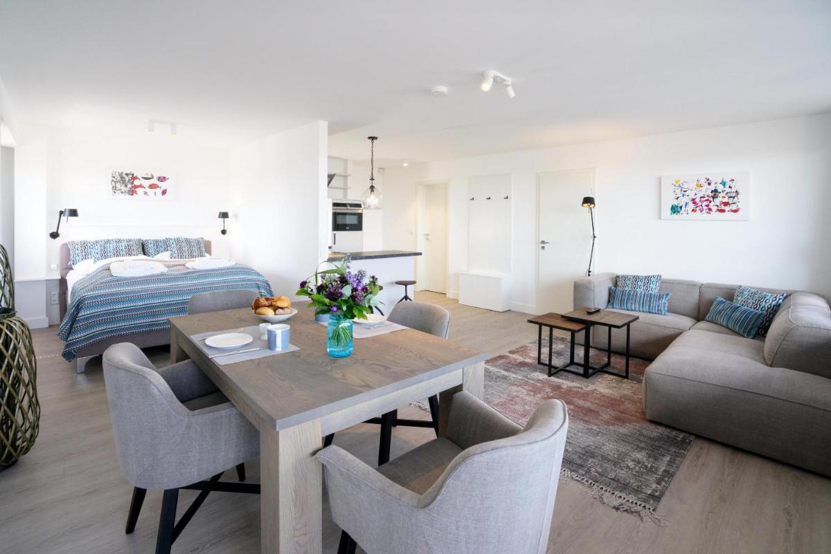 Ferienwohnung Sylter Welle mit kleinem Meerblick - Housity