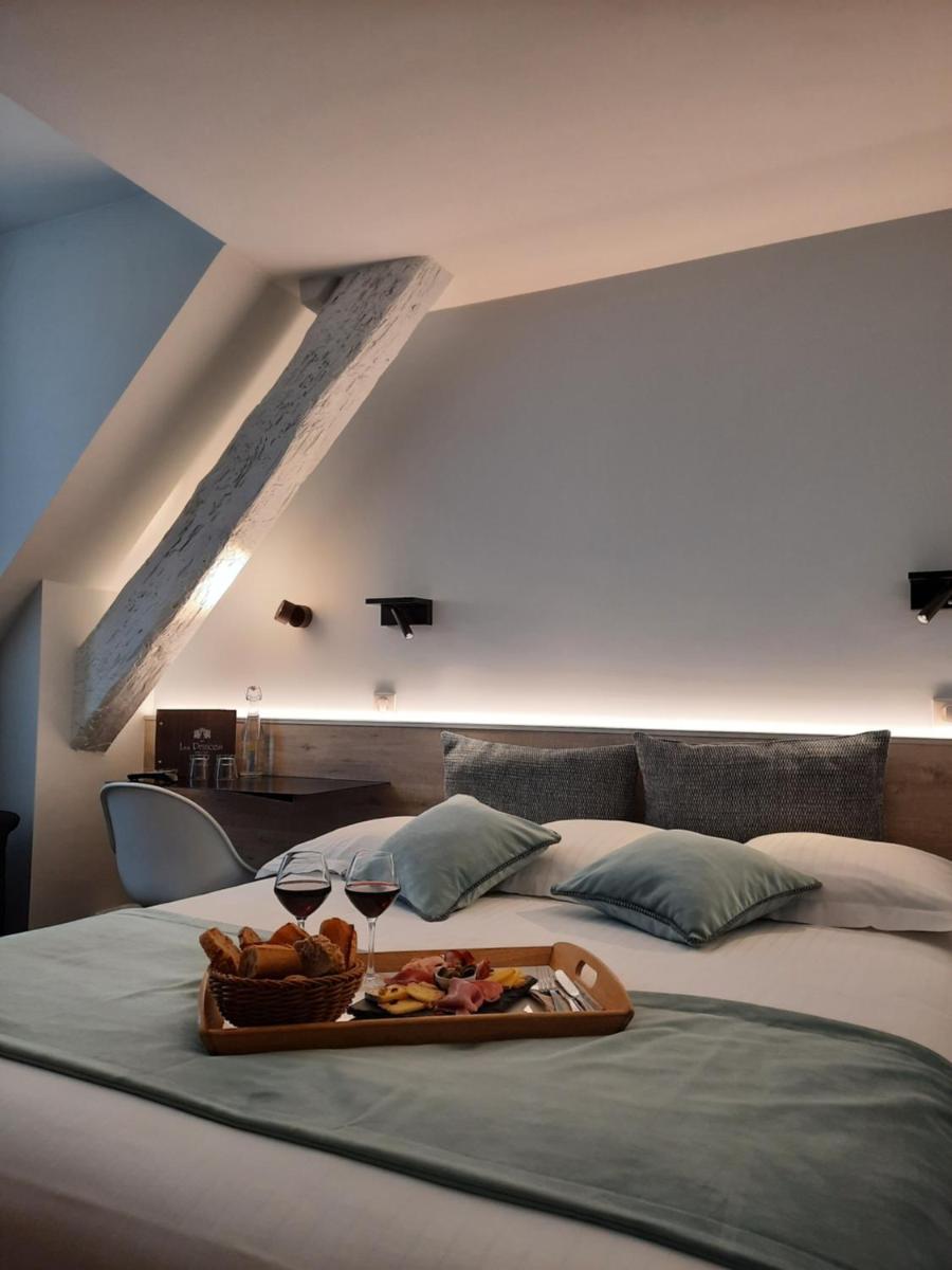 Un ou plusieurs lits dans un hébergement de l'établissement Hôtel des Princes, Chambéry Centre