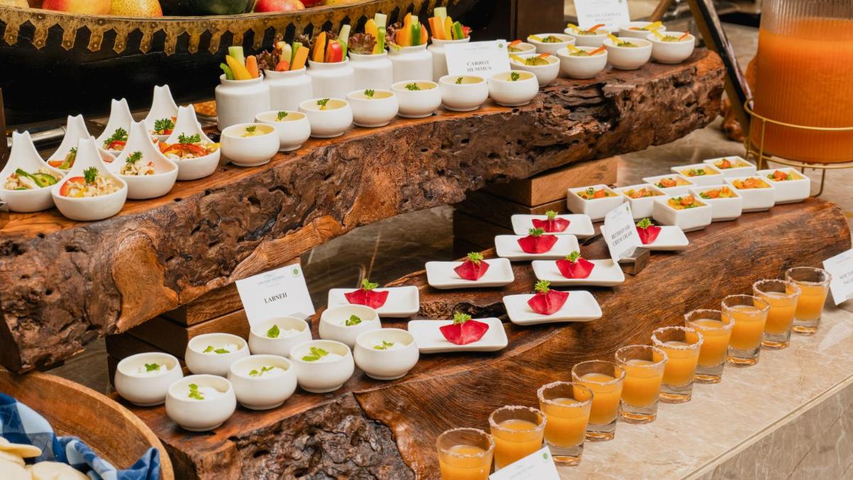 a display of appetizers and drinks on a table at Gateway Goa, Palolem in Palolem