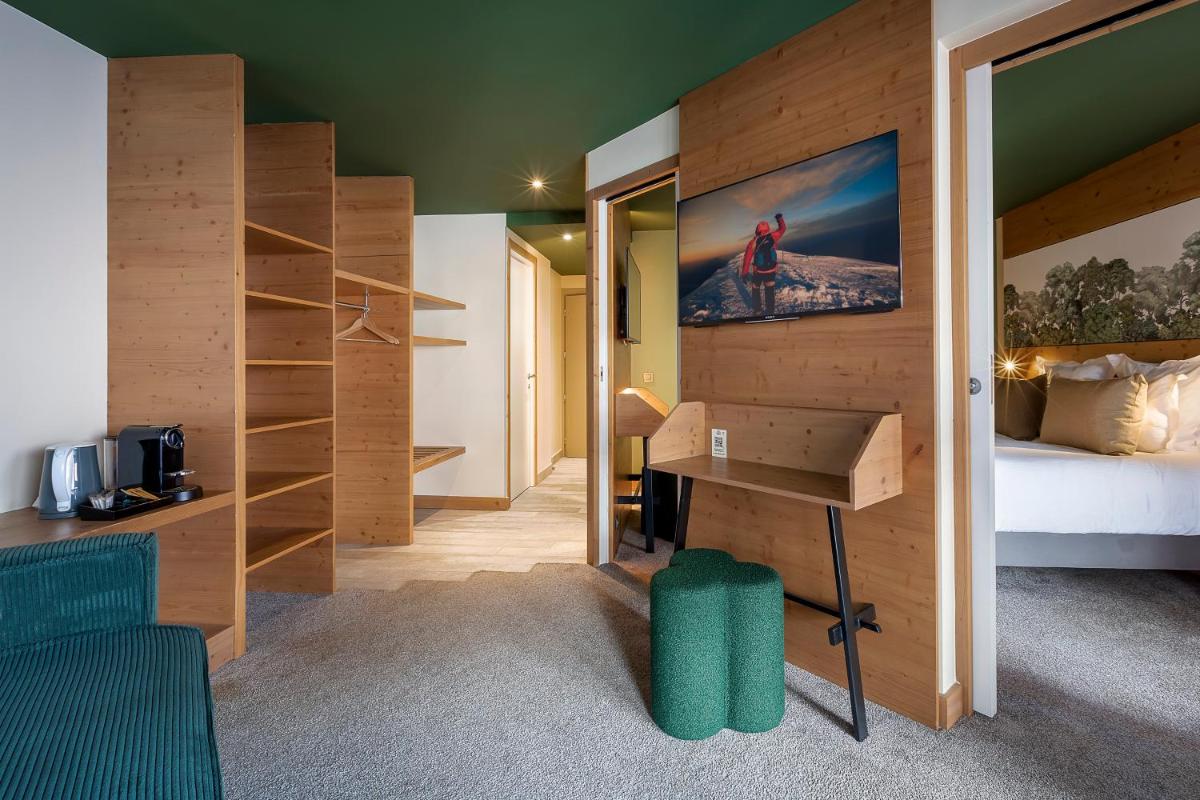 Un ou plusieurs lits dans un hébergement de l'établissement Lykke Hôtel & Spa Chamonix - ex Mercure