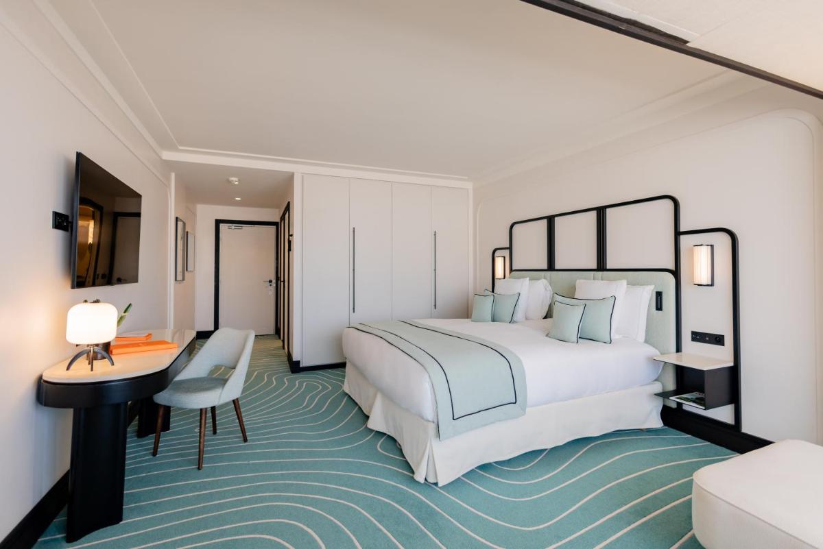 Un ou plusieurs lits dans un hébergement de l'établissement Mondrian Cannes