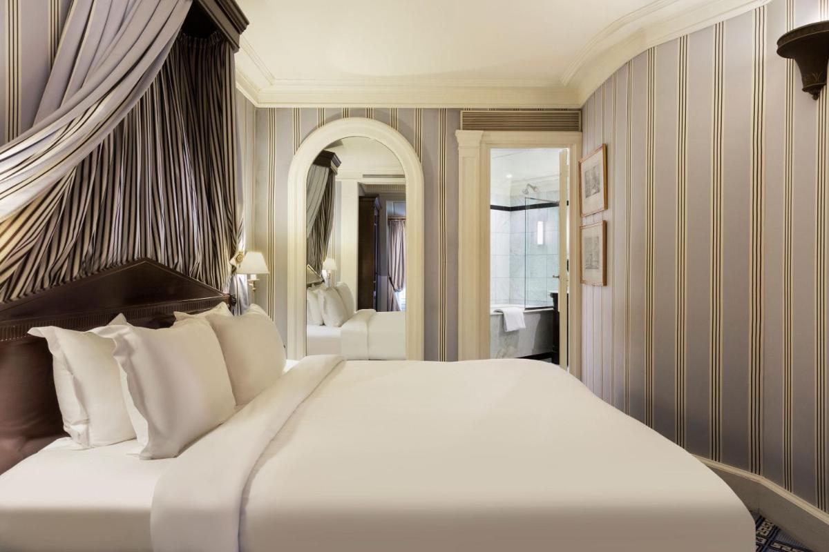 Un ou plusieurs lits dans un hébergement de l'établissement Le Dokhan's Paris Arc de Triomphe, a Tribute Portfolio Hotel
