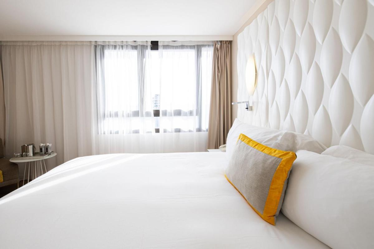 Un ou plusieurs lits dans un hébergement de l'établissement Renaissance Aix-en-Provence Hotel