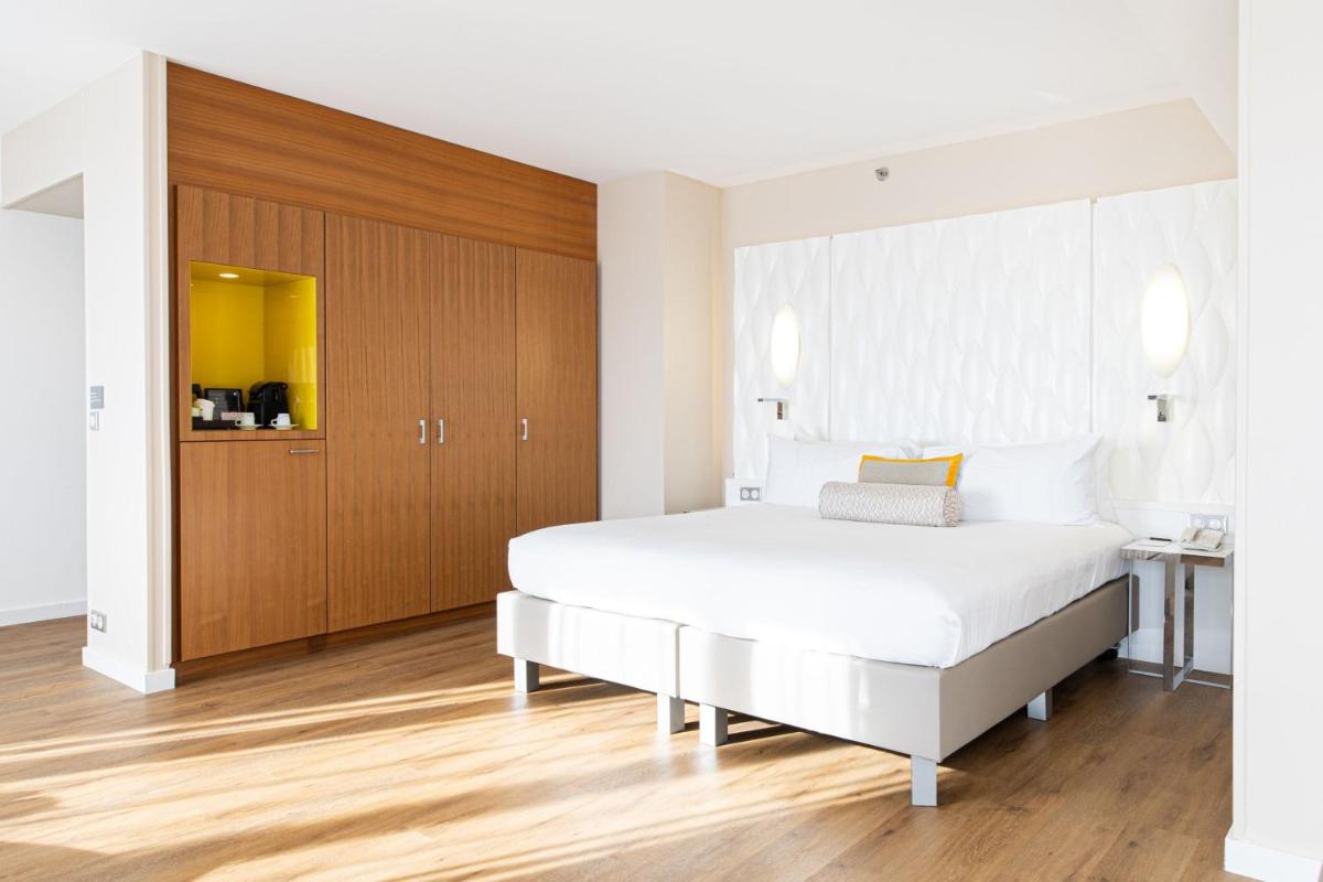 Un ou plusieurs lits dans un hébergement de l'établissement Renaissance Aix-en-Provence Hotel