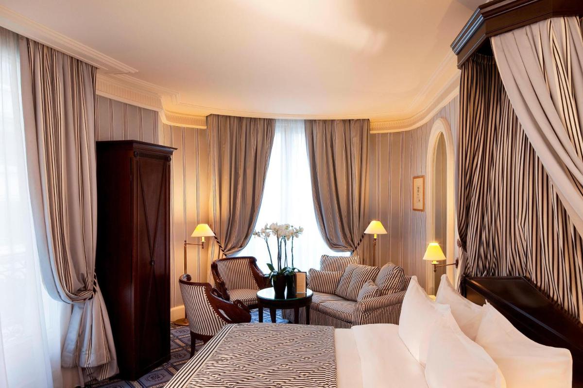 Un ou plusieurs lits dans un hébergement de l'établissement Le Dokhan's Paris Arc de Triomphe, a Tribute Portfolio Hotel