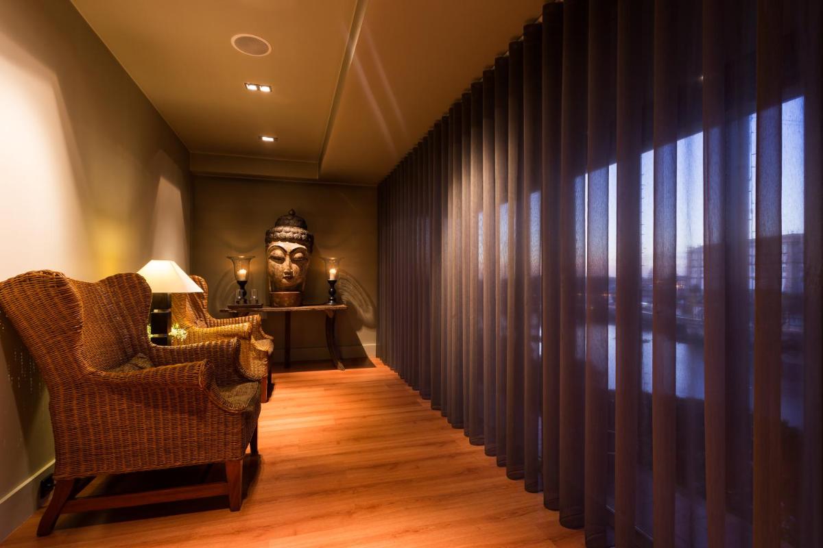 Uma área de estar em Santana Hotel & SPA