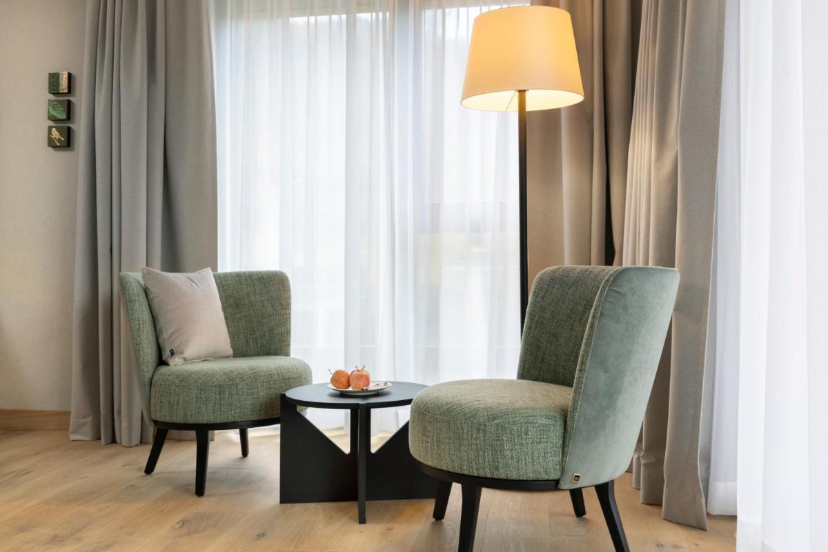 Ein Sitzbereich in der Unterkunft Wellness & Genuss Resort - Engel Obertal