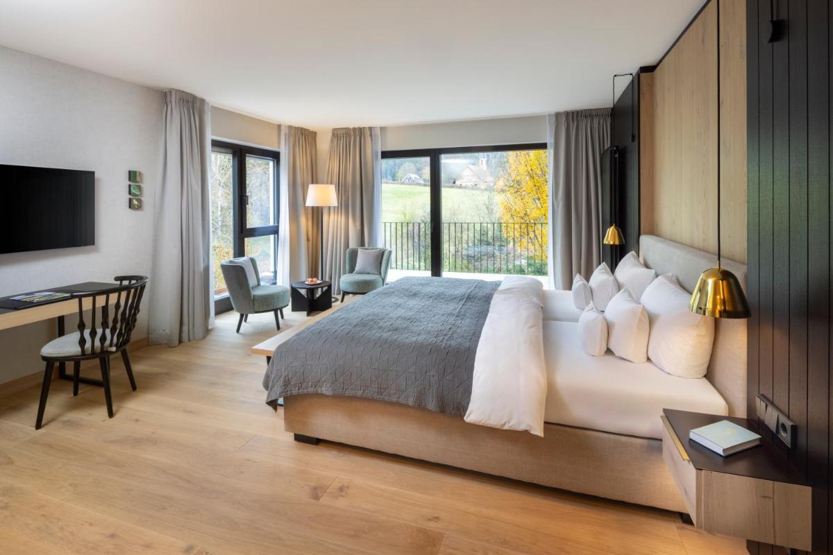 Ein Bett oder Betten in einem Zimmer der Unterkunft Wellness & Genuss Resort - Engel Obertal