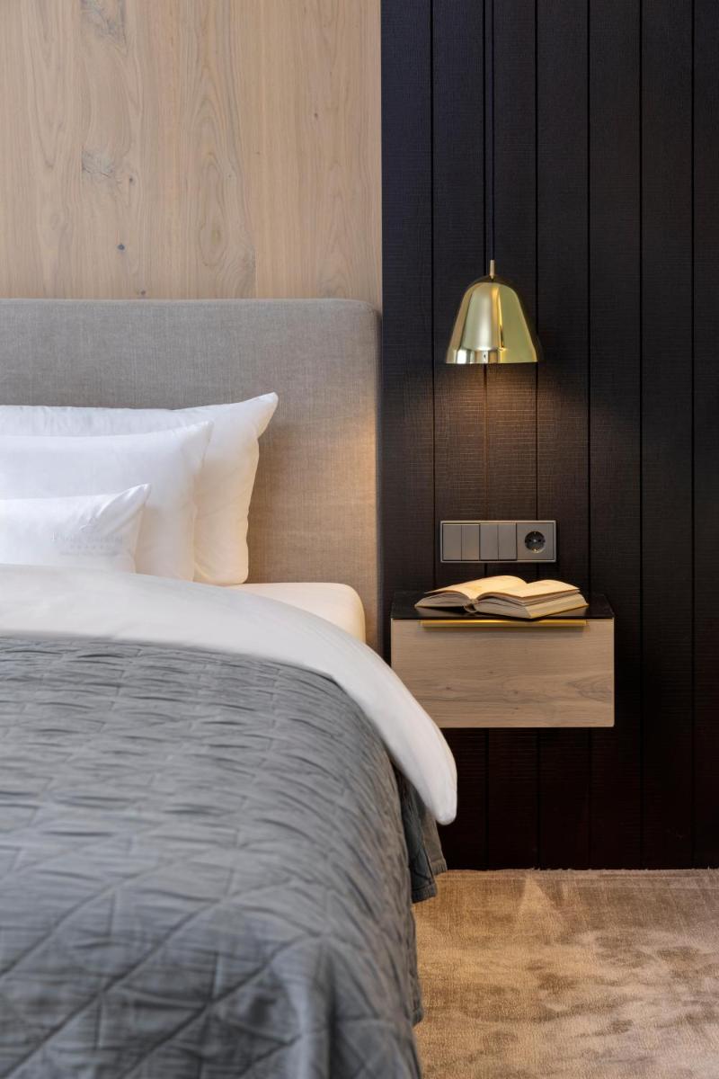 Ein Bett oder Betten in einem Zimmer der Unterkunft Wellness & Genuss Resort - Engel Obertal