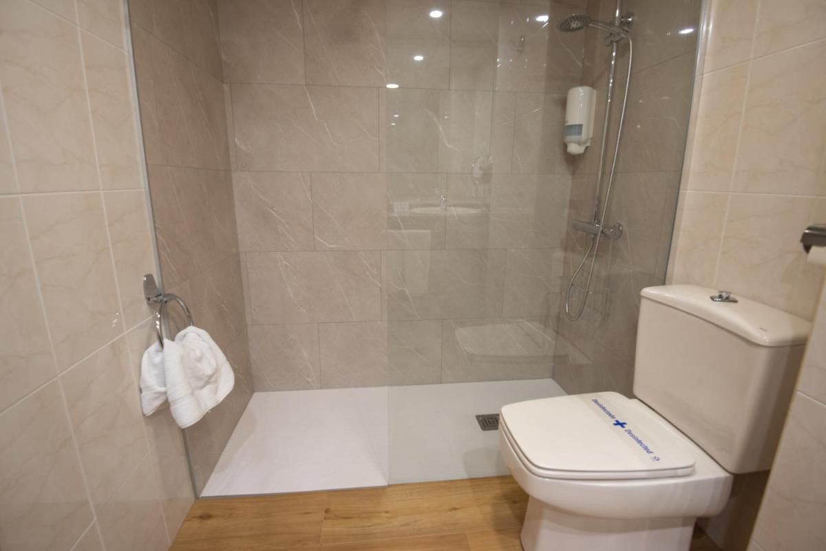 Un baño de Hotel Eth Solan & SPA