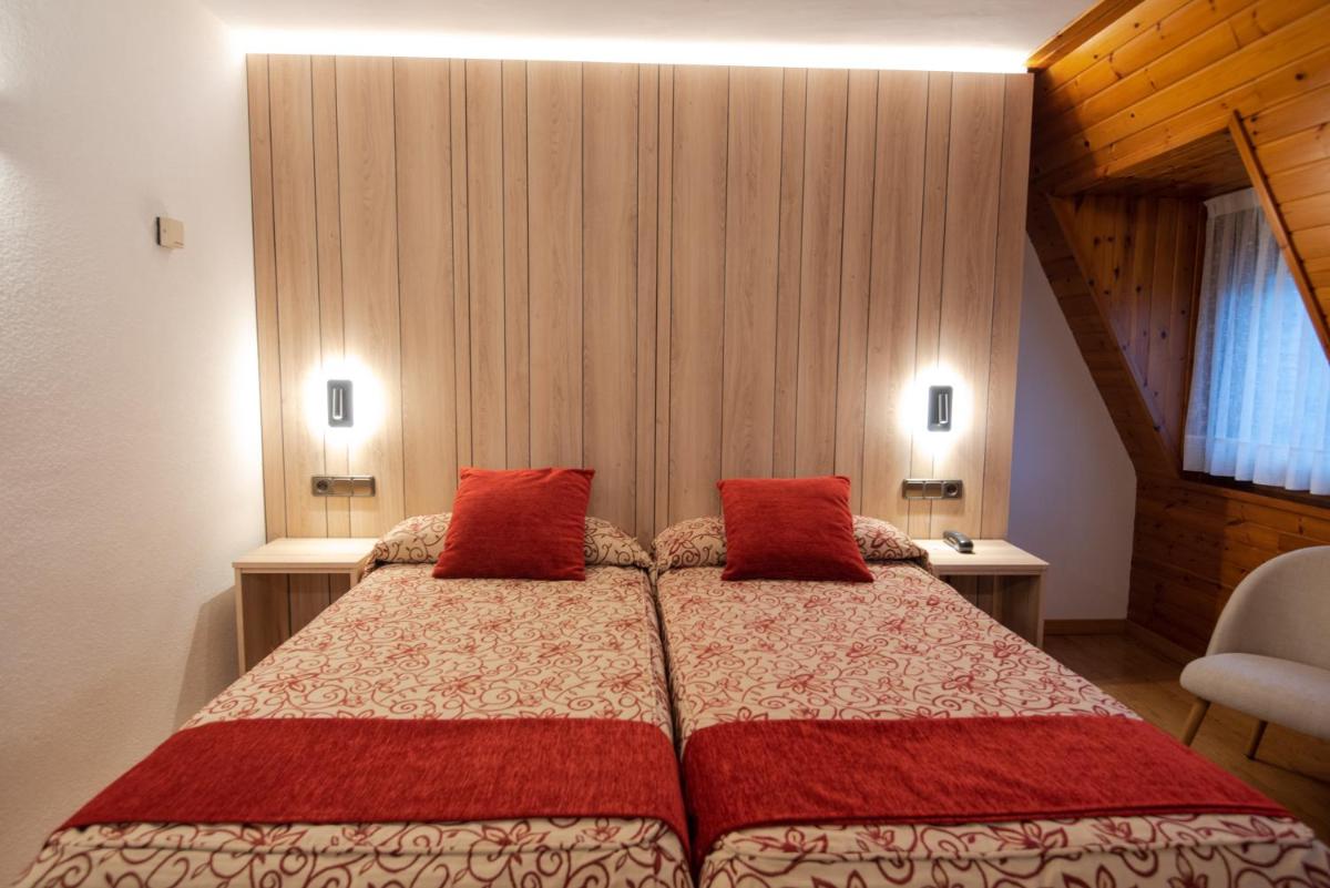 Cama o camas de una habitación en Hotel Eth Solan & SPA