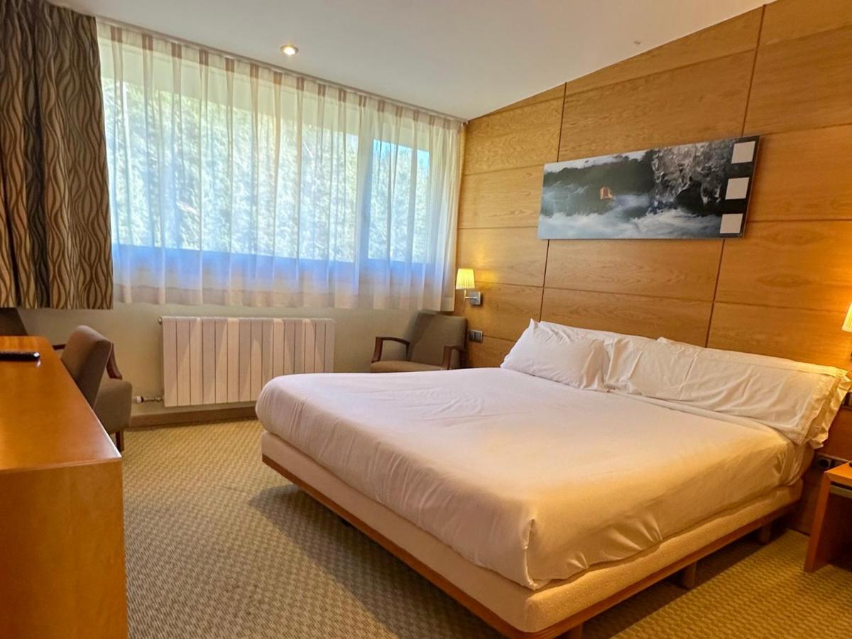 Cama o camas de una habitación en Hotel & Spa La Collada