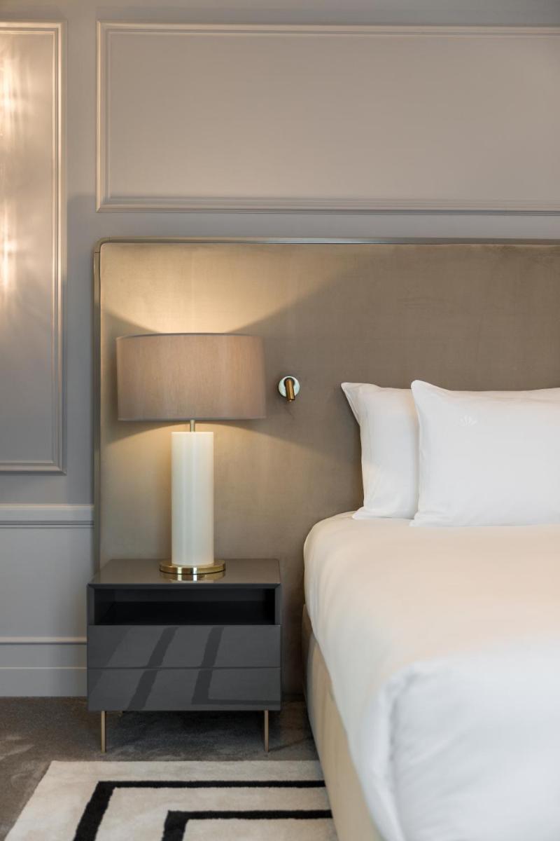 Uma cama ou camas num quarto em Amoure Hotel - The Leading Hotels of the World
