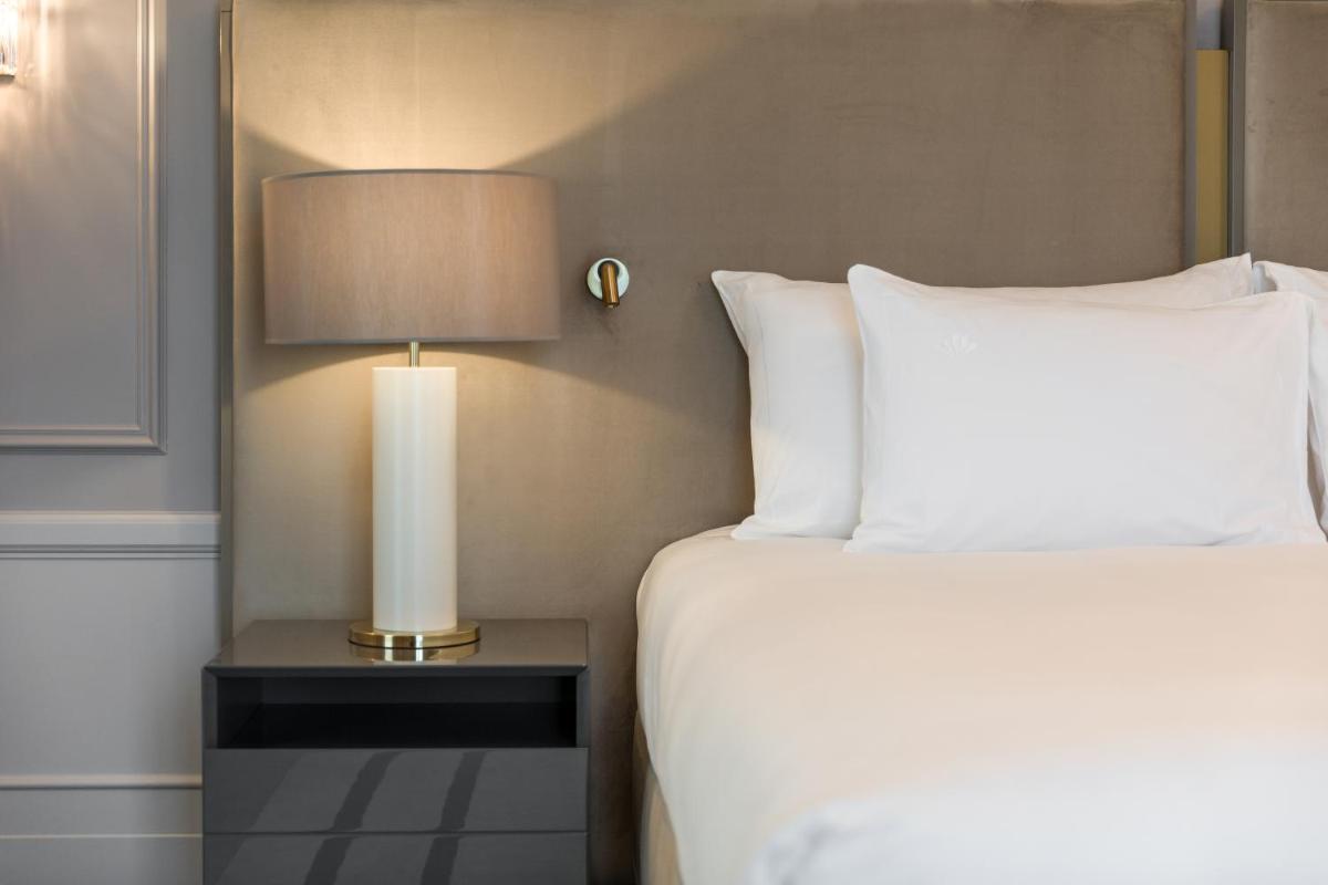 Uma cama ou camas num quarto em Amoure Hotel - The Leading Hotels of the World
