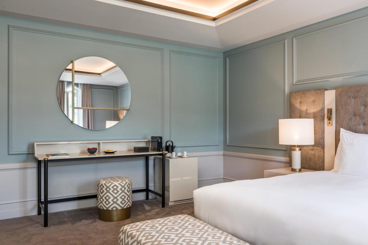 Uma cama ou camas num quarto em Amoure Hotel - The Leading Hotels of the World