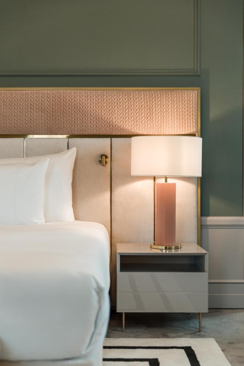 Uma cama ou camas num quarto em Amoure Hotel - The Leading Hotels of the World