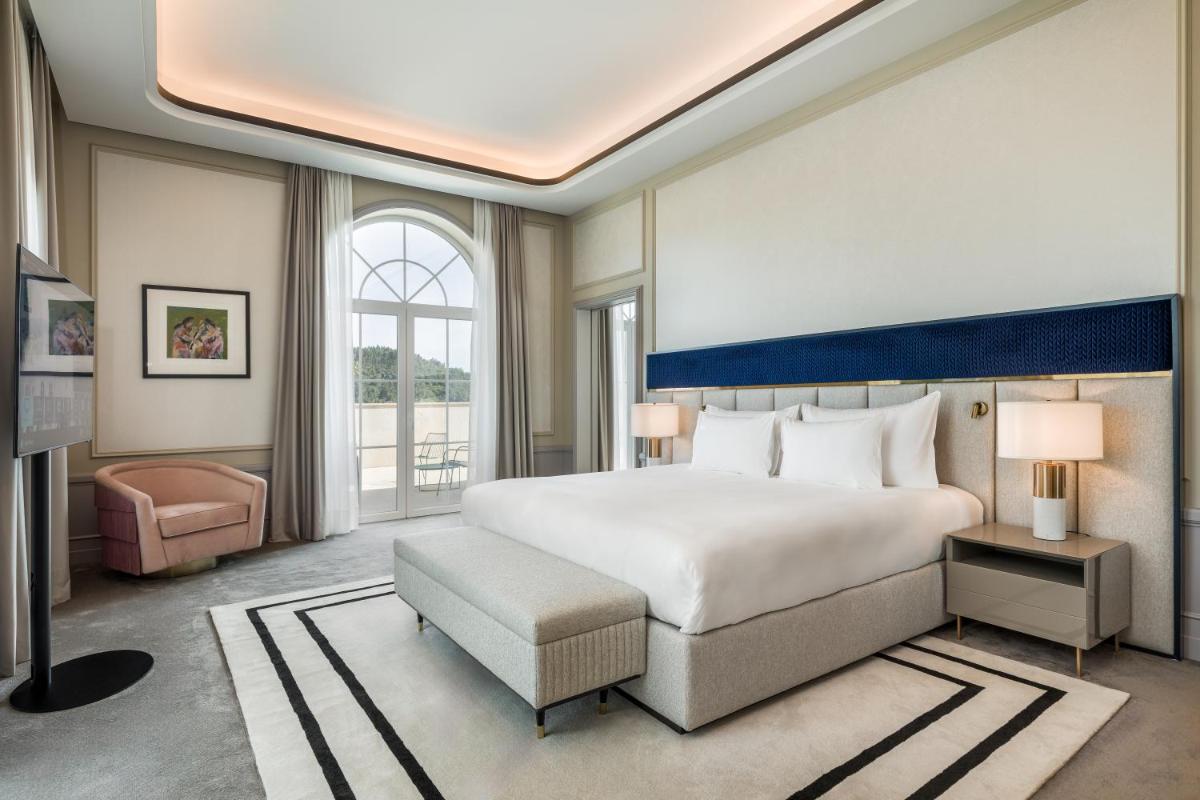 Uma cama ou camas num quarto em Amoure Hotel - The Leading Hotels of the World