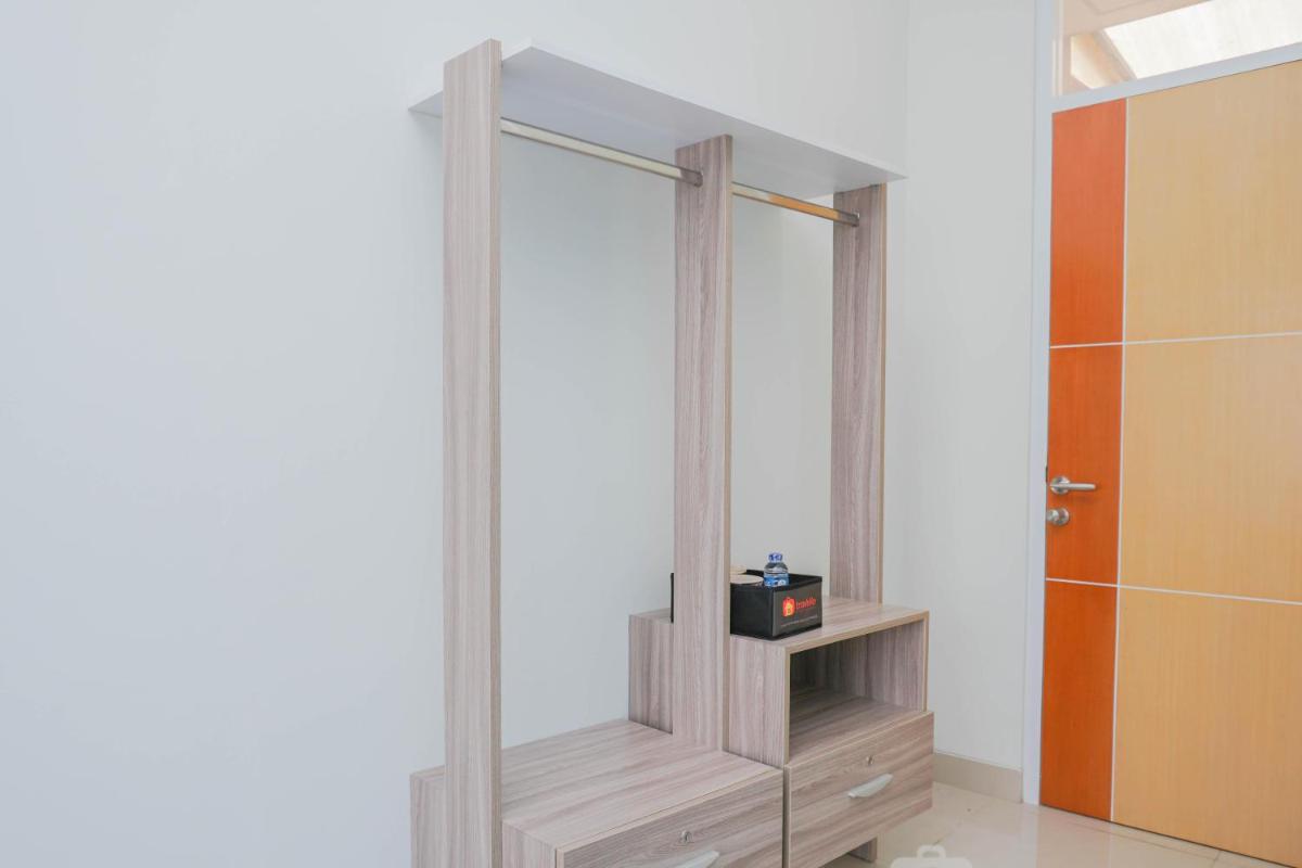 Cozy Studio at Guest House Way Seputih near Central Park By Travelio - Housity