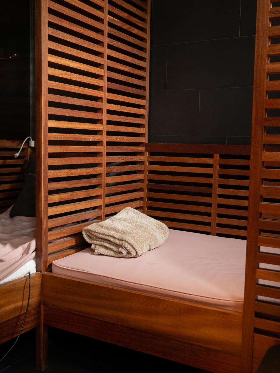 Cama o camas de una habitación en Hostal Empúries