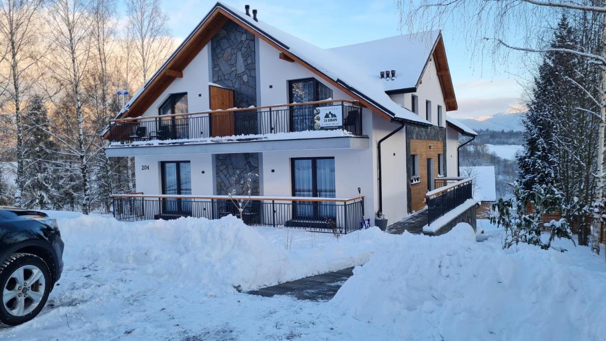 Za Górami - Housity
