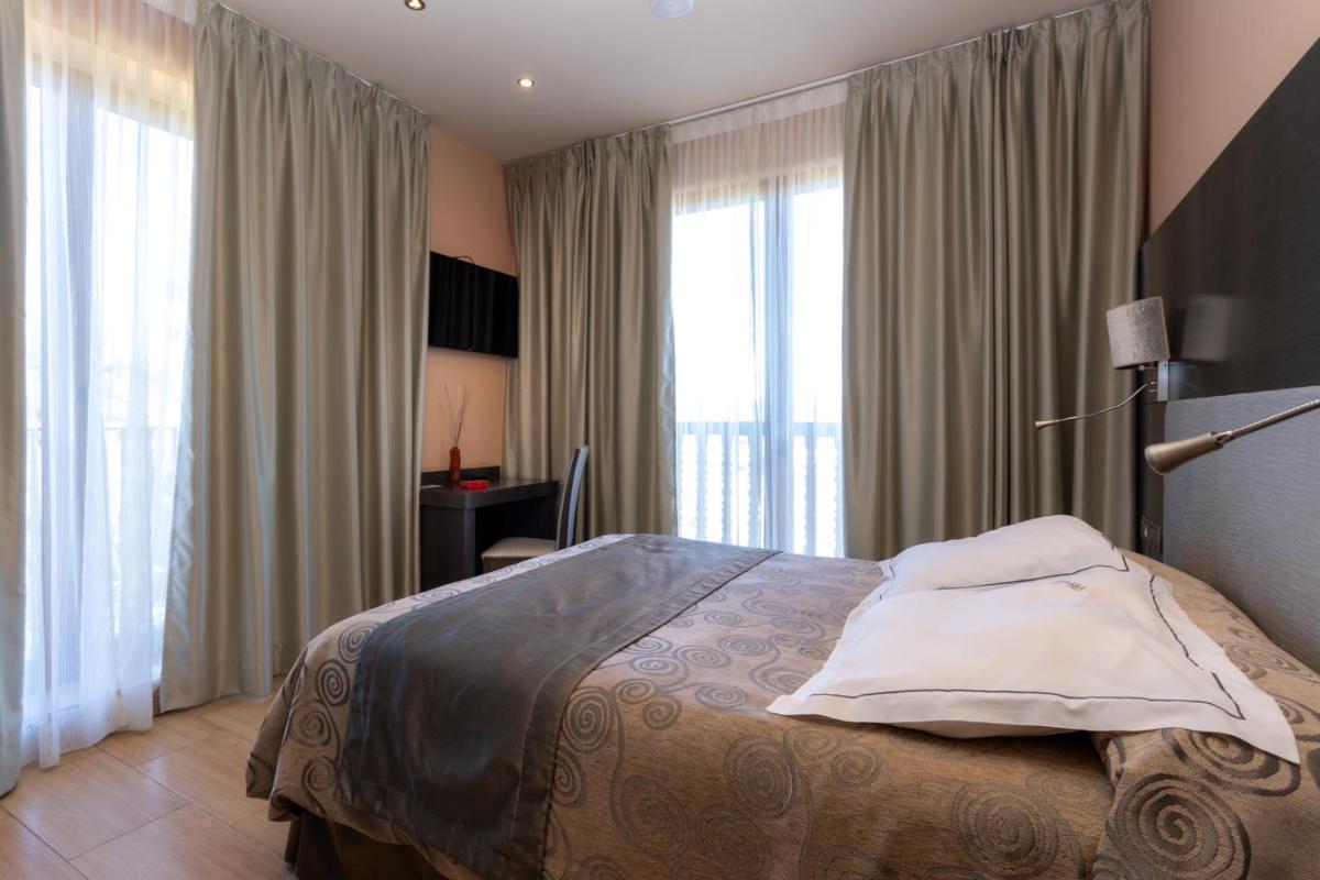 Cama o camas de una habitación en Hotel Felisa SPA