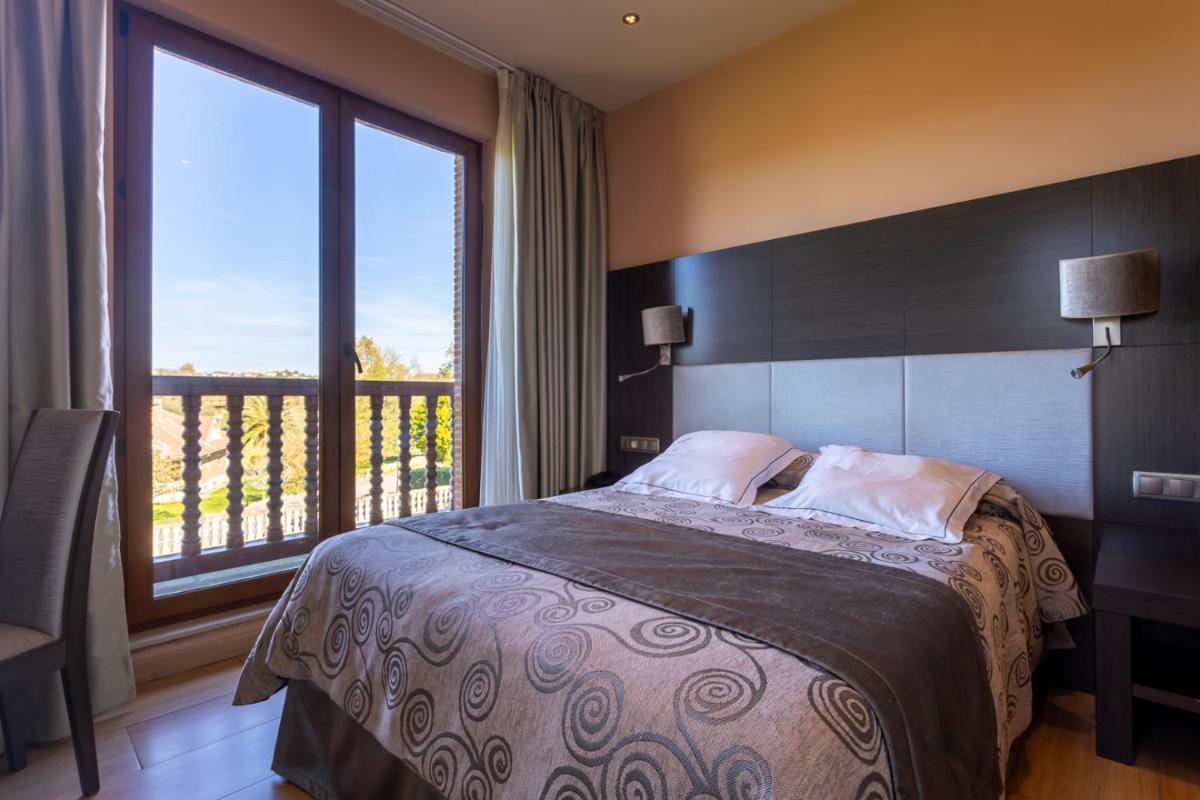 Cama o camas de una habitación en Hotel Felisa SPA