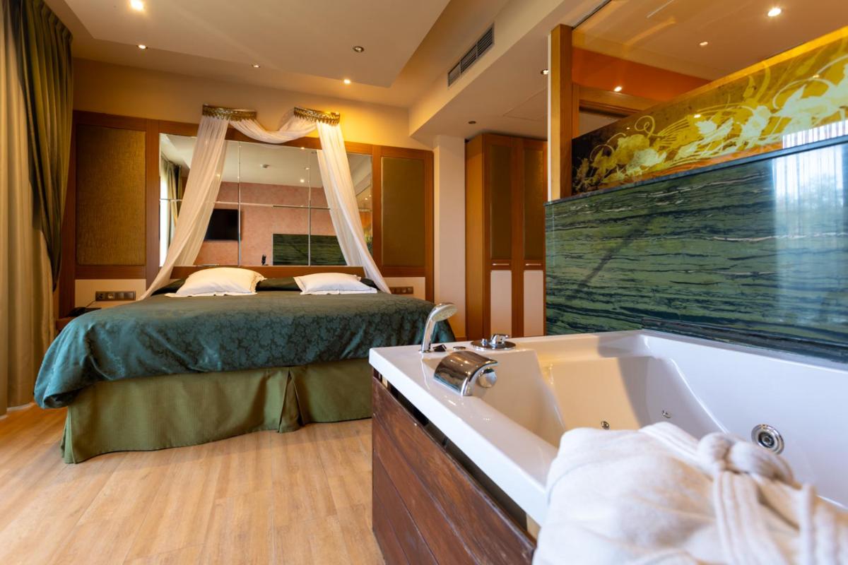 Cama o camas de una habitación en Hotel Felisa SPA
