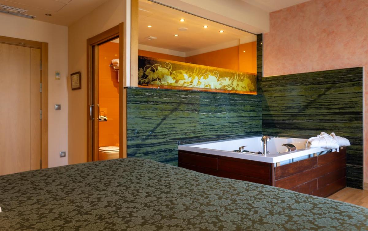 Cama o camas de una habitación en Hotel Felisa SPA