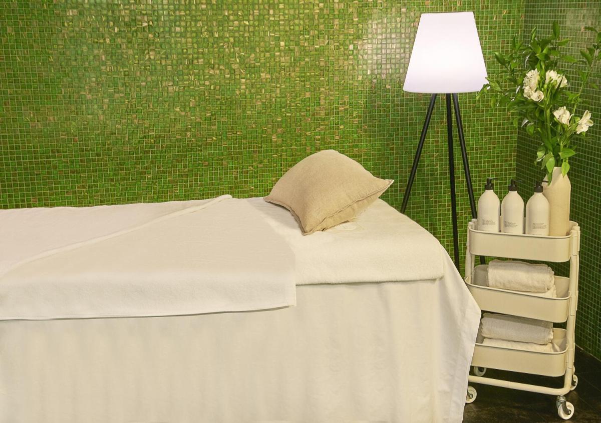 Cama o camas de una habitación en NH Collection Barcelona Constanza