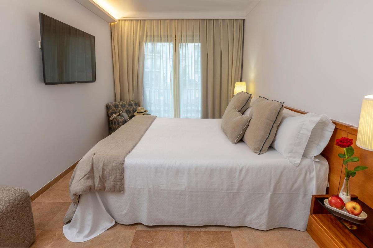 Cama o camas de una habitación en Hotel Spa Porto Cristo