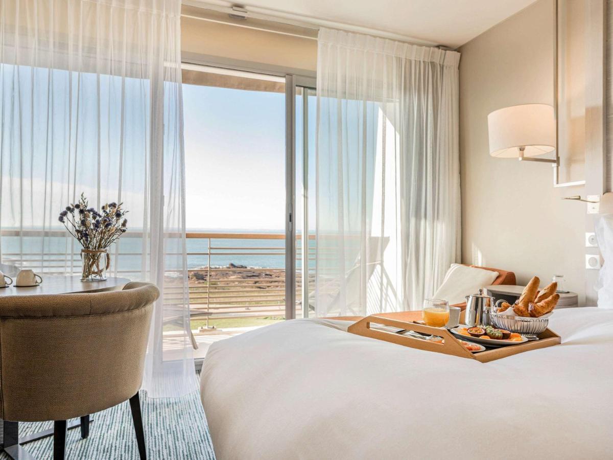 Un ou plusieurs lits dans un hébergement de l'établissement Sofitel Quiberon Thalassa sea & spa