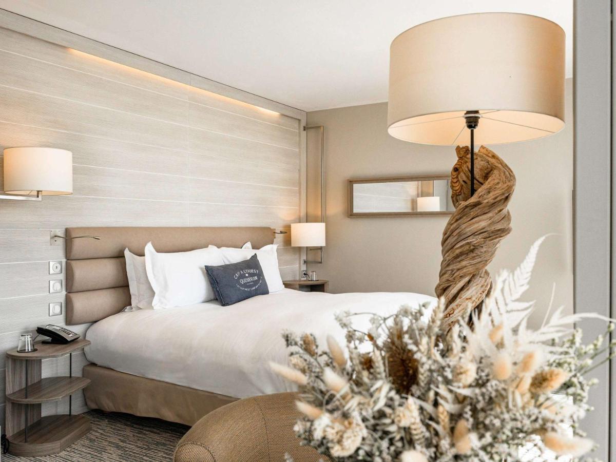 Un ou plusieurs lits dans un hébergement de l'établissement Sofitel Quiberon Thalassa sea & spa