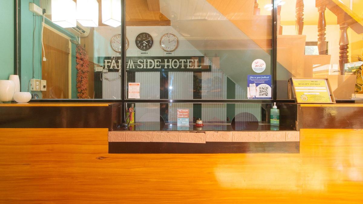 RedDoorz @ Farm Side Hotel Laoag City - Housity