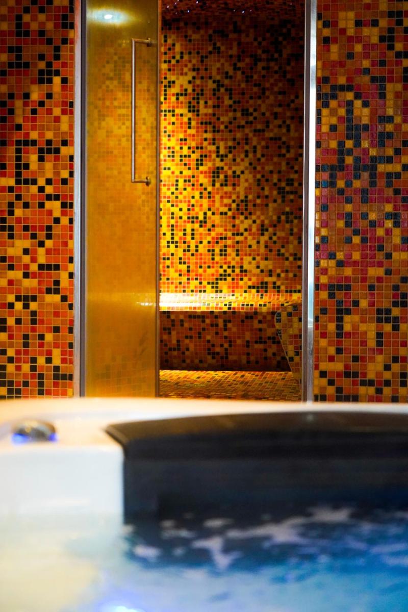 Salle de bains dans l'établissement Hôtel U Palazzu & Spa