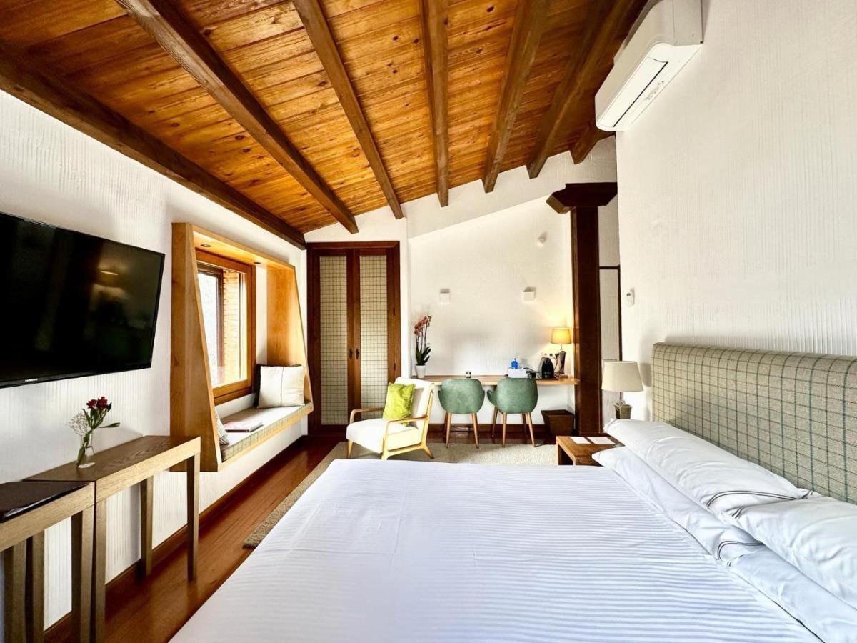 Cama o camas de una habitación en Molino de Alcuneza Relais & Châteaux