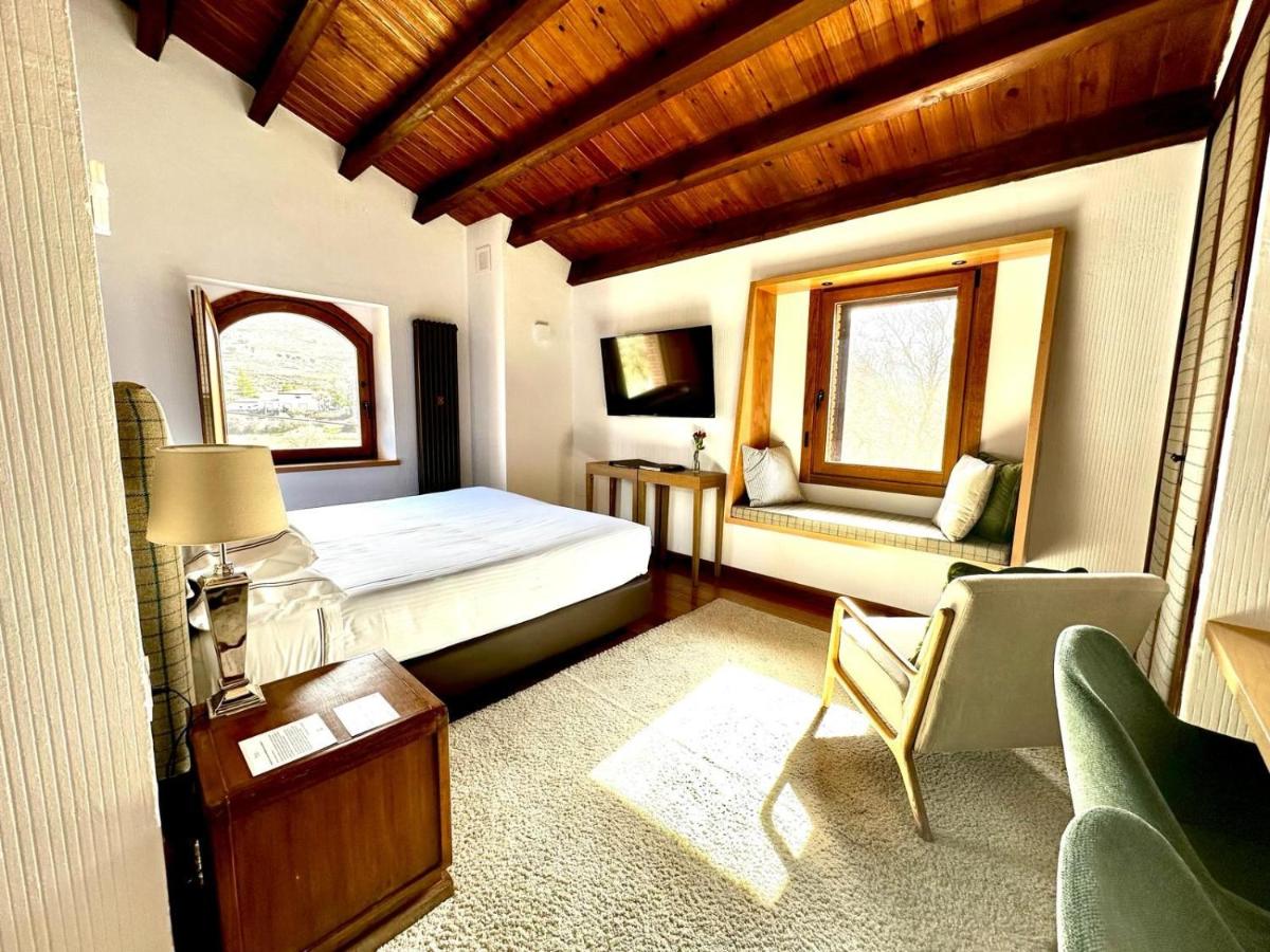 Cama o camas de una habitación en Molino de Alcuneza Relais & Châteaux