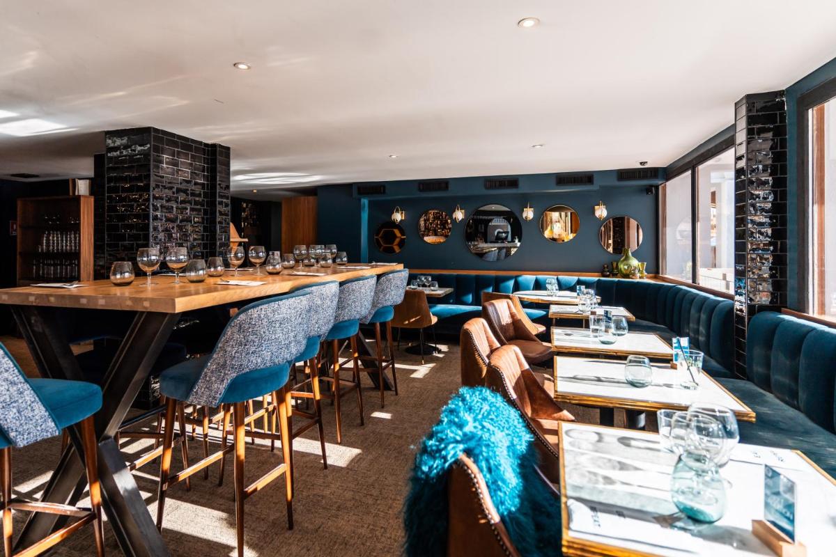 Coin salon dans l'établissement Fahrenheit Seven Courchevel