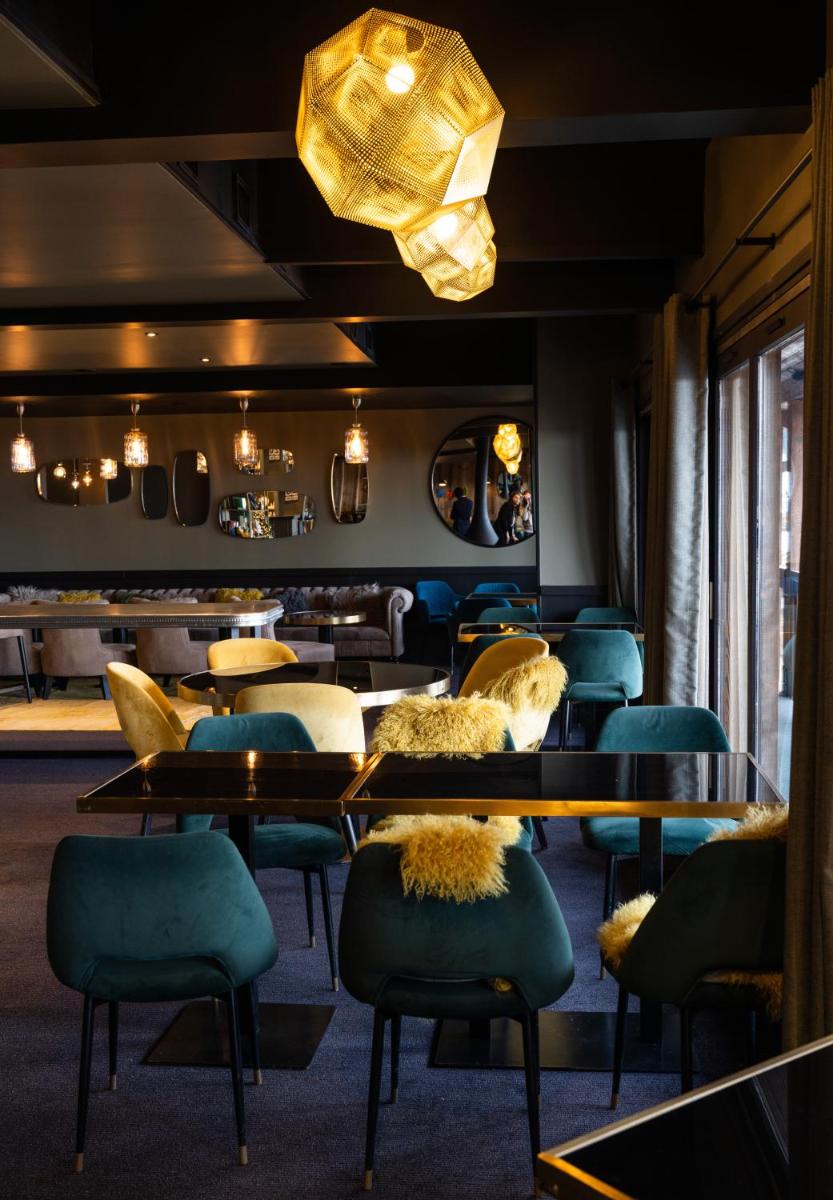 Coin salon dans l'établissement Fahrenheit Seven Courchevel