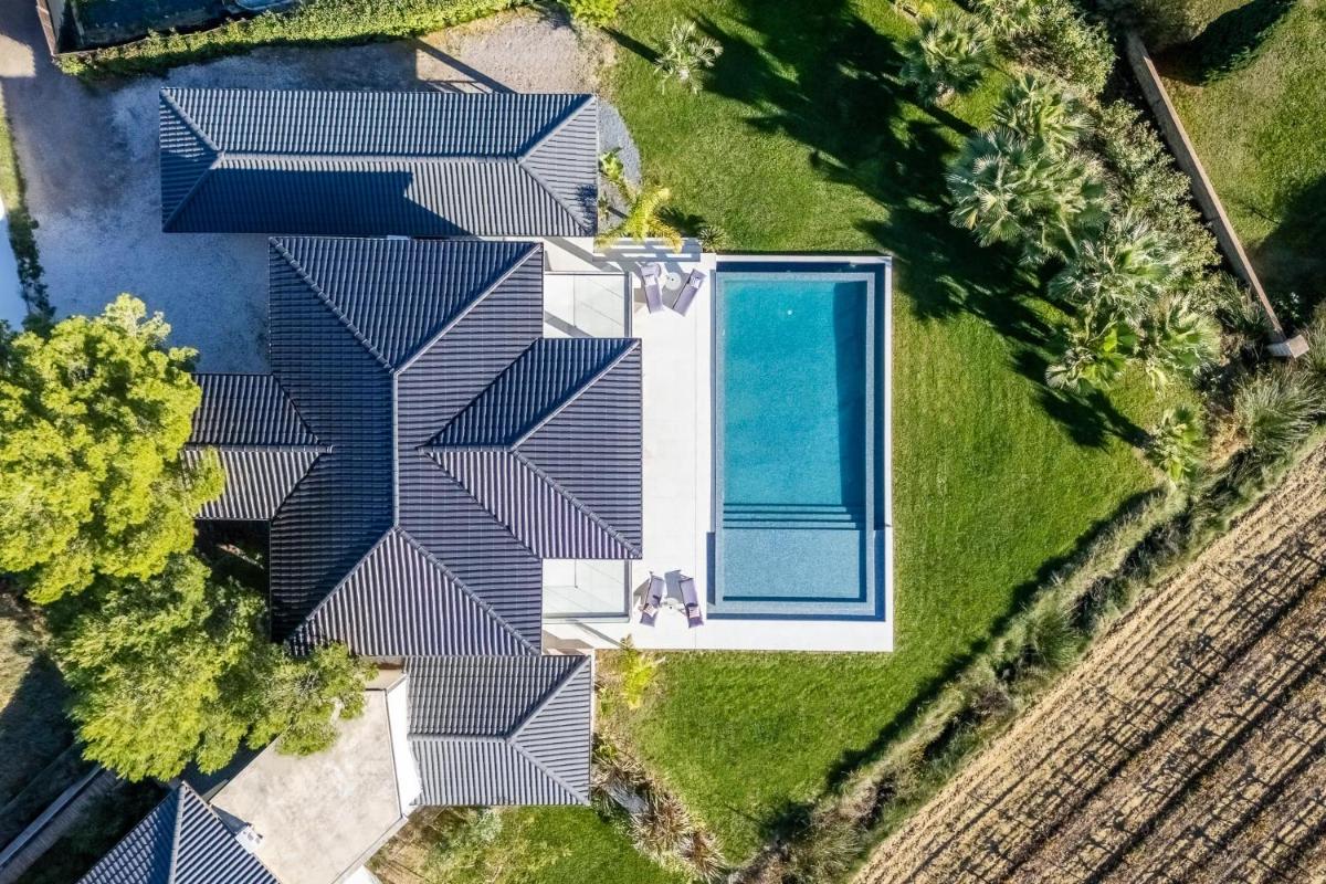 Royal Tiki Lodges - Chambres d'hôtes avec Piscine chauffée & SPA - Housity