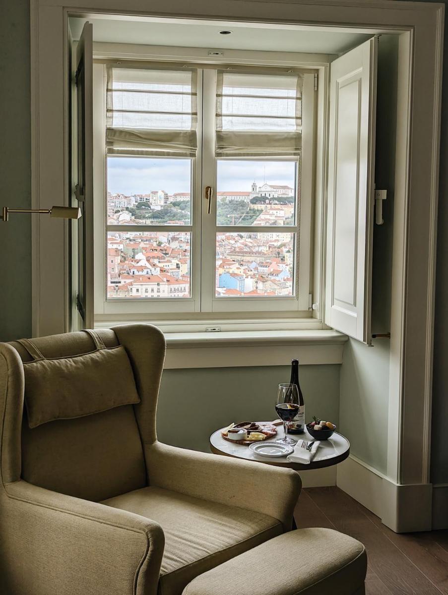 Uma área de estar em Palácio Ludovice Wine Experience Hotel
