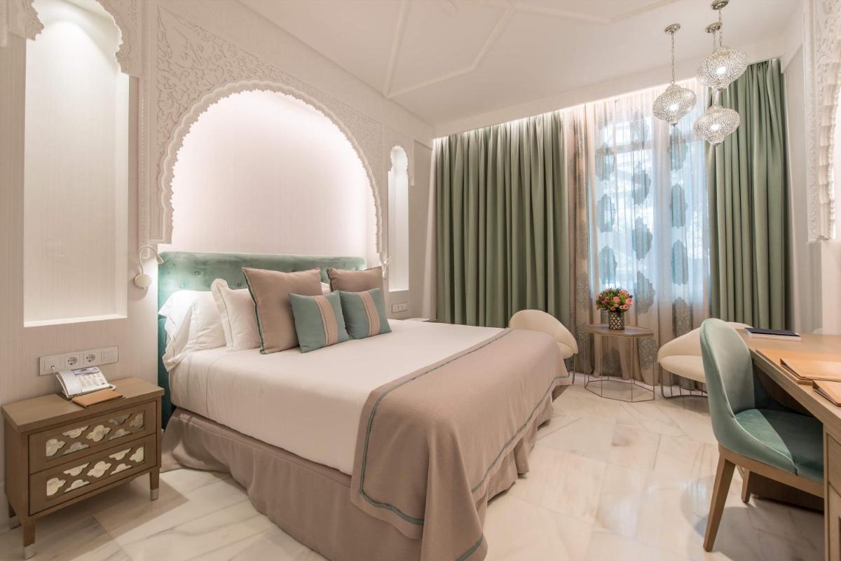 Cama o camas de una habitación en Gran Hotel Miramar GL