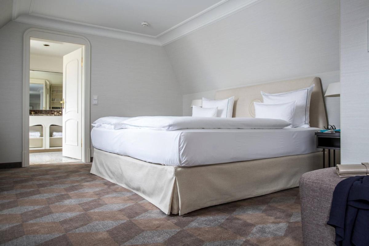 Ein Bett oder Betten in einem Zimmer der Unterkunft Gewandhaus Dresden, Autograph Collection