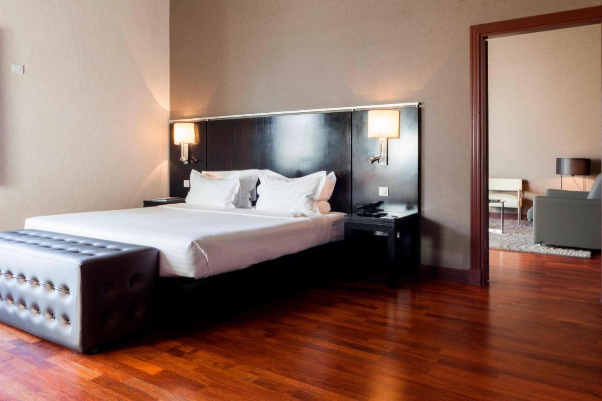 Cama o camas de una habitación en AC Hotel Palacio de Santa Ana by Marriott