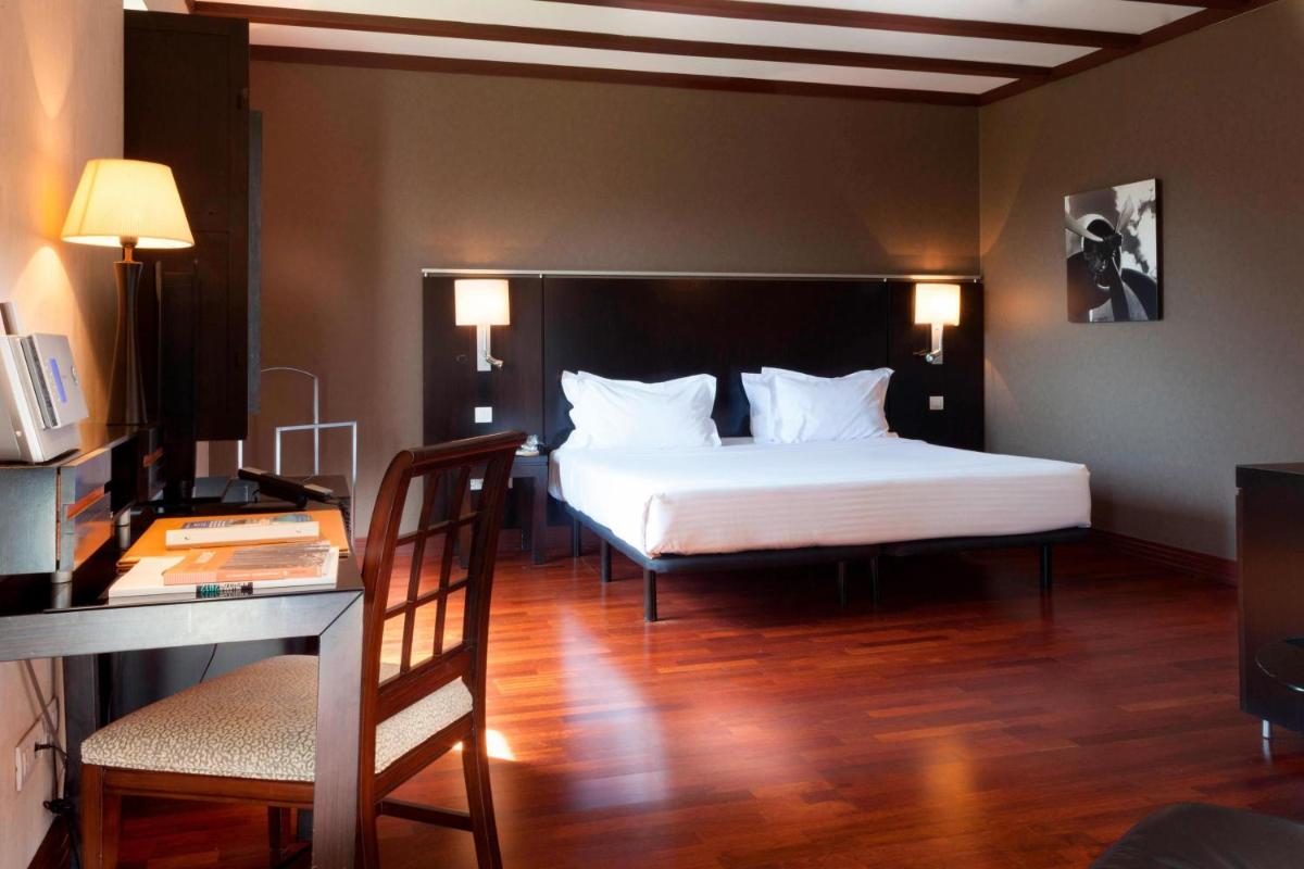 Cama o camas de una habitación en AC Hotel Palacio de Santa Ana by Marriott