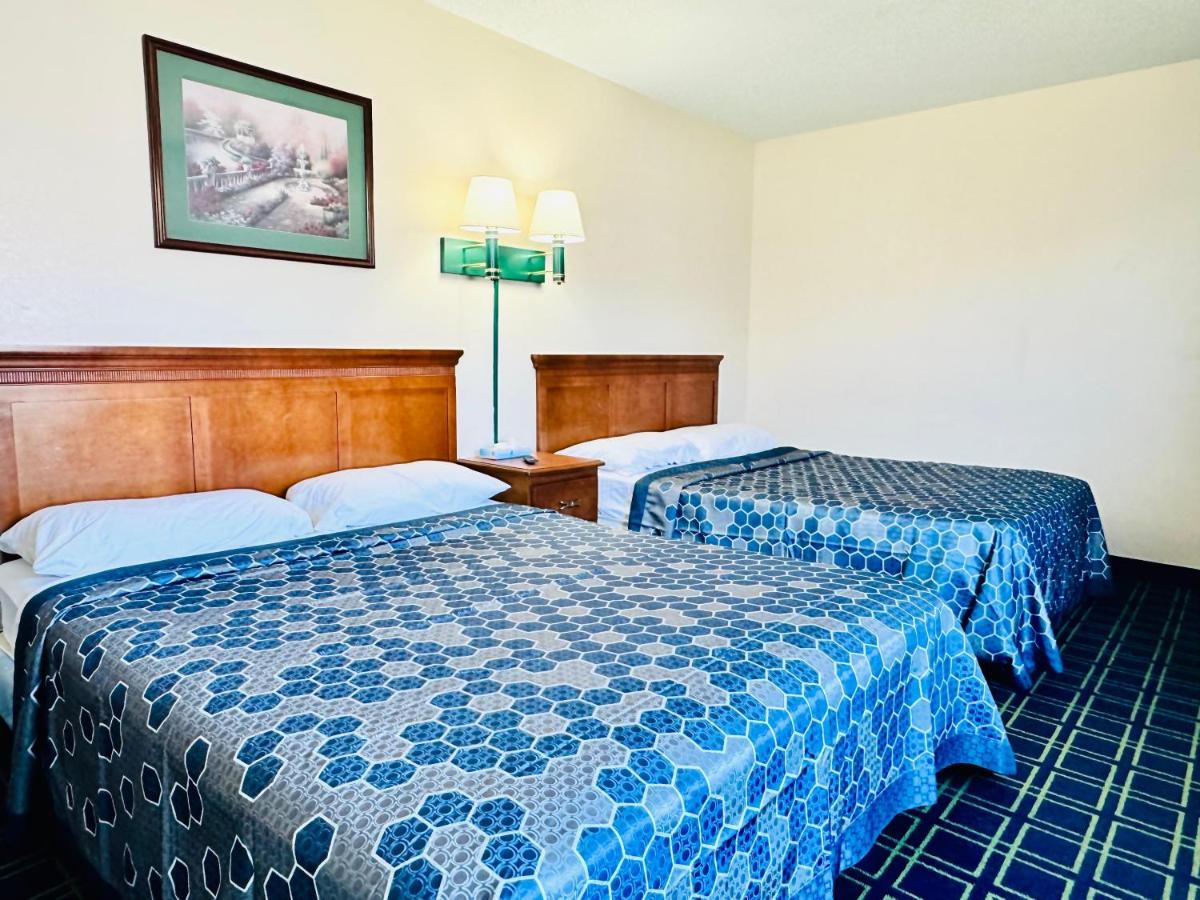 Sunset Inn and Suites - Housity