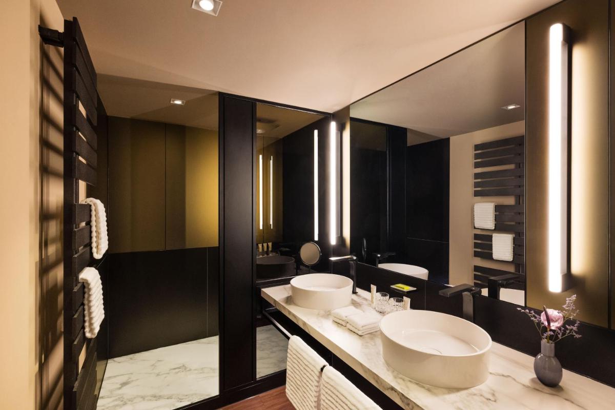 Ein Badezimmer in der Unterkunft Le Méridien Hamburg