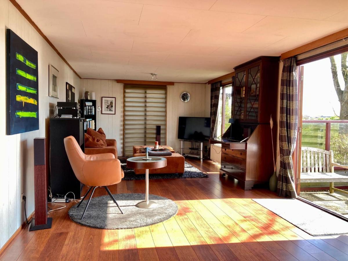 Tolles 2 Pers Haus König mit Hafenblick am Lauwersmeer - Housity